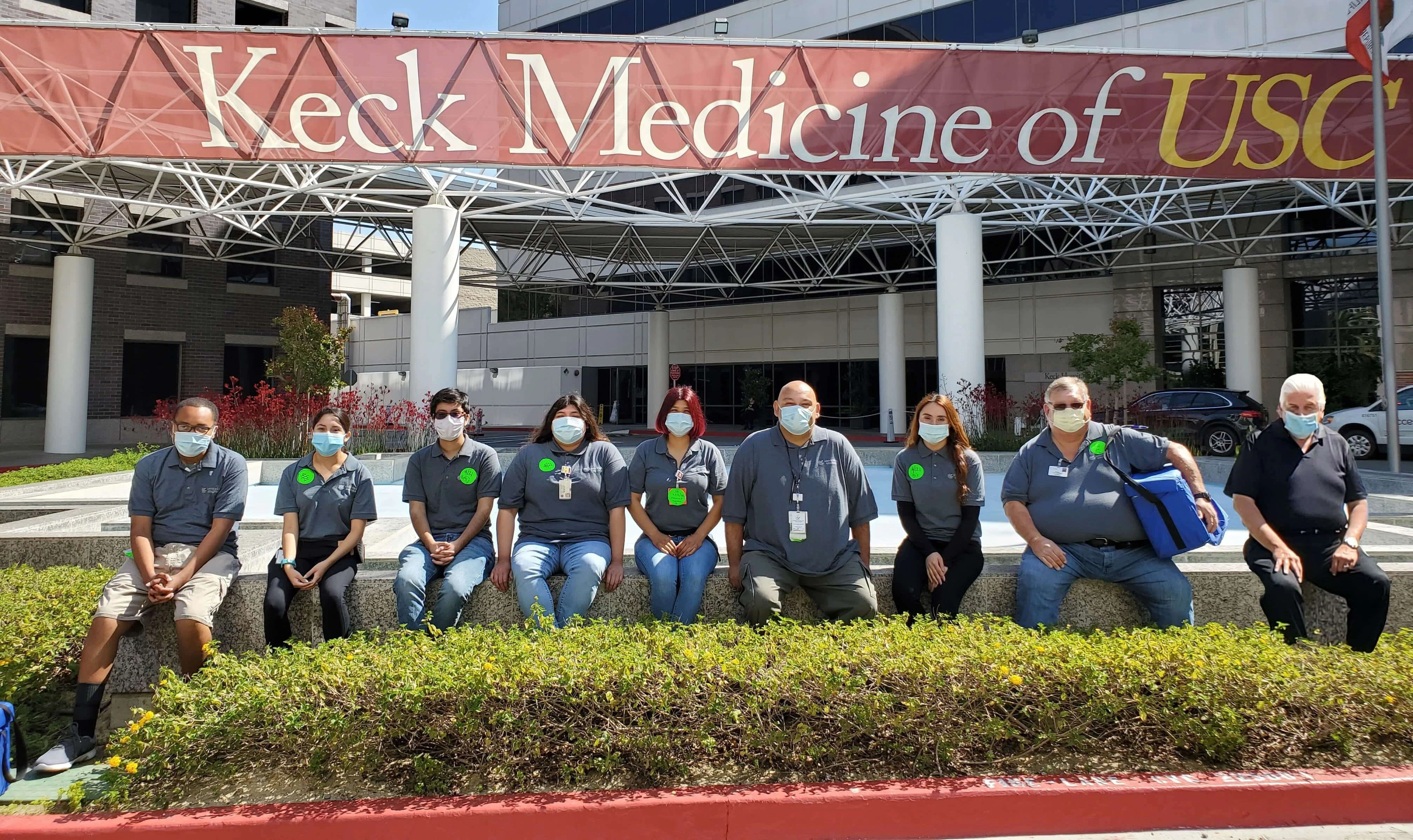 Universal Courier Medical Drivers in front of Keck Medicine of USC.